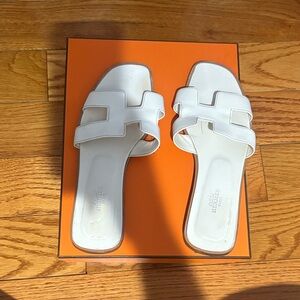 Hermes Oran Sandals in white